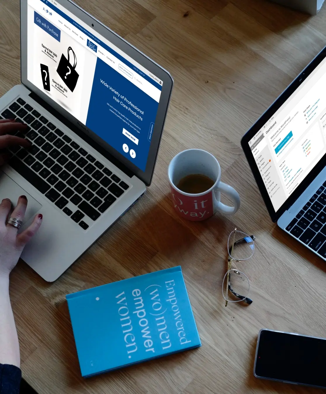 Team collaborating on website development using laptops, reflecting Netmore’s creative and technical teamwork as a web design agency in Malaysia.