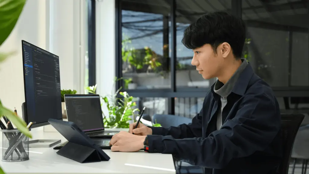 Developer performing WordPress updates and security checks. Website maintenance services Malaysia.